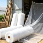 Agricultural insect net rolls at farm storage area for pest control