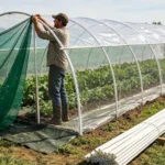 fiberglass support rods, greenhouse film, insect net and shade net on farm